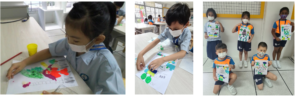 Young masked children in school uniforms work on colorful art projects, and a group proudly holds up their finished drawings.